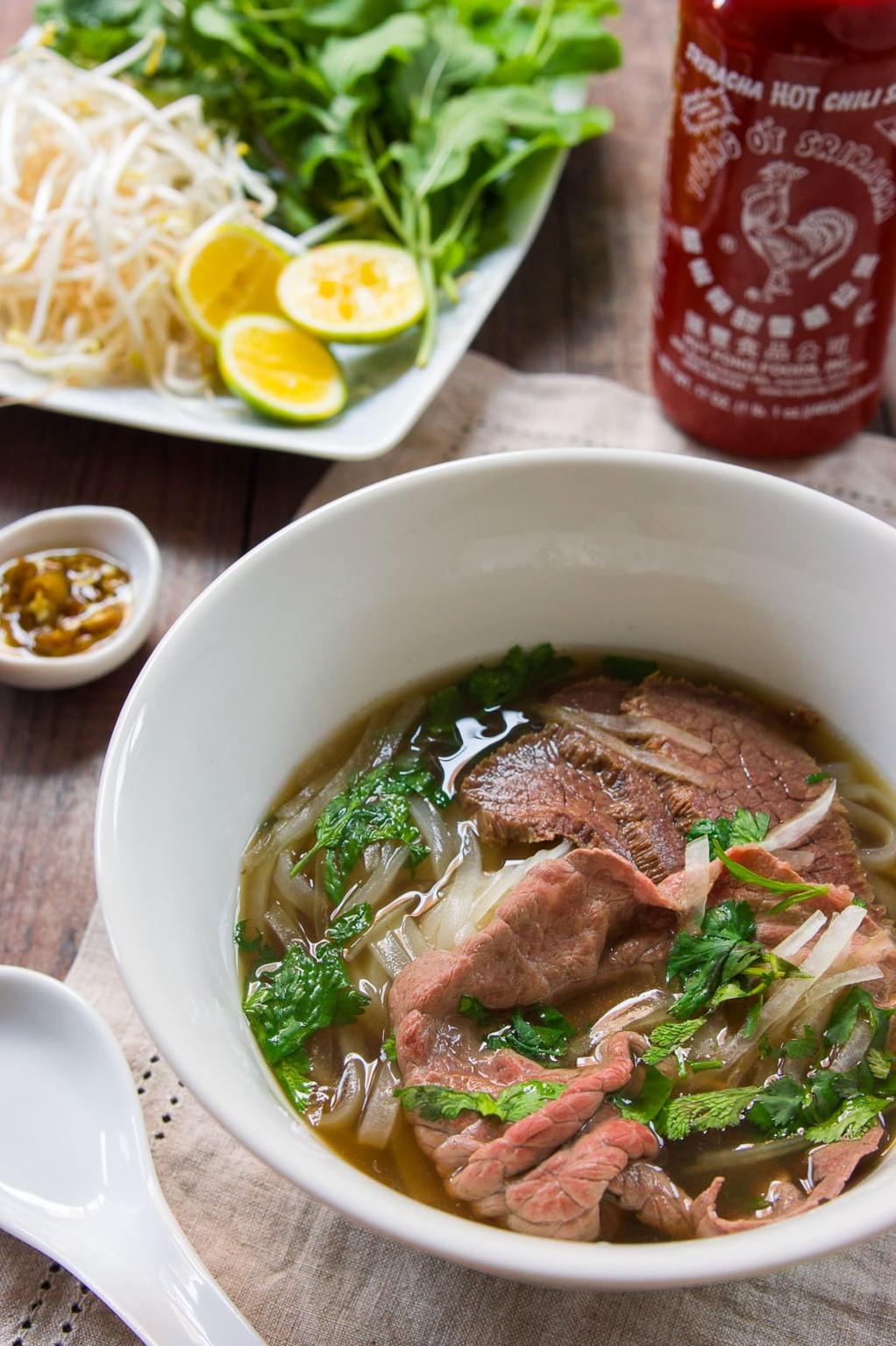  A steaming bowl of fragrant Pho Tai is perfect for a comforting and hearty meal.