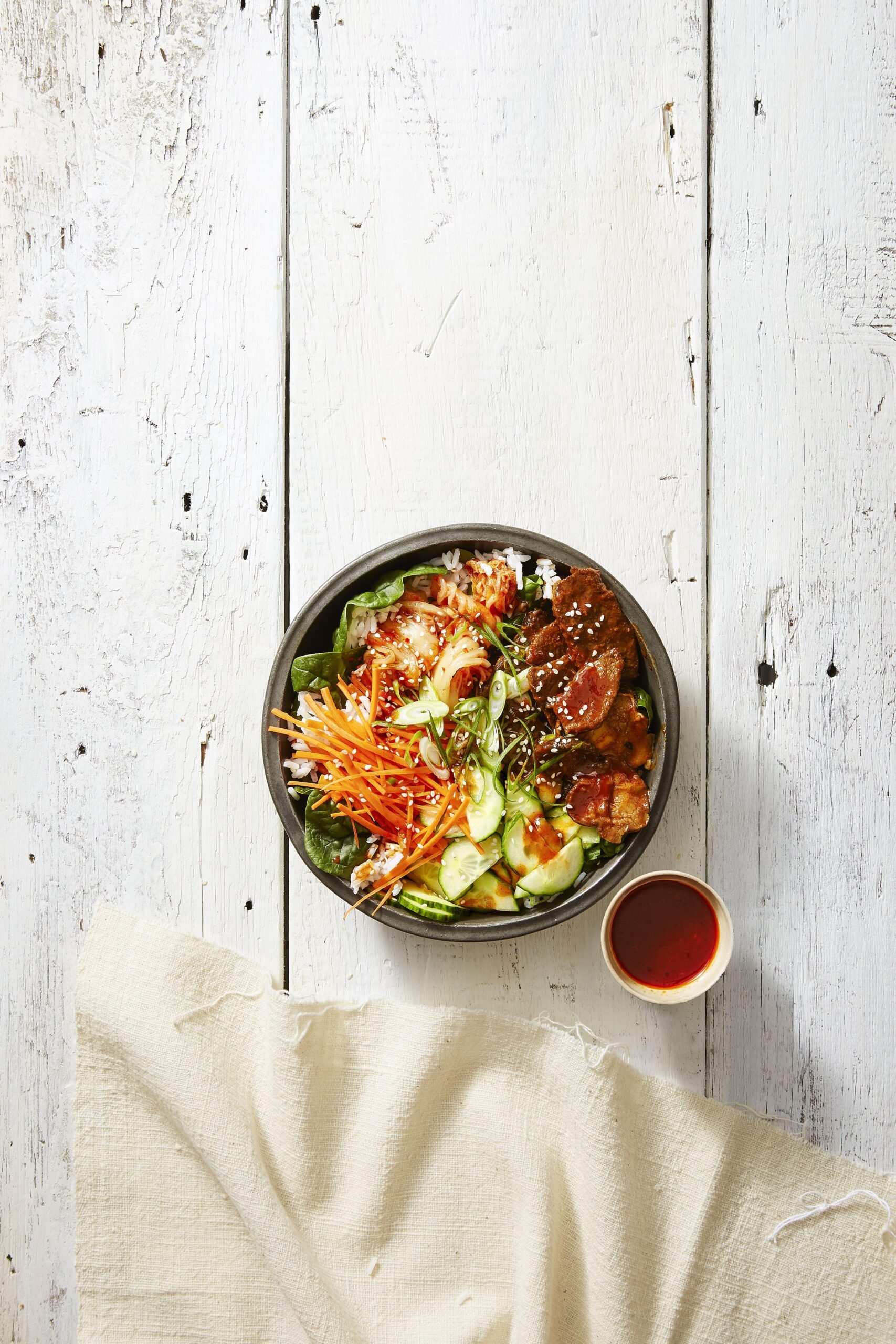  A warm and hearty bowl of rice beautifully layered with colorful veggies.