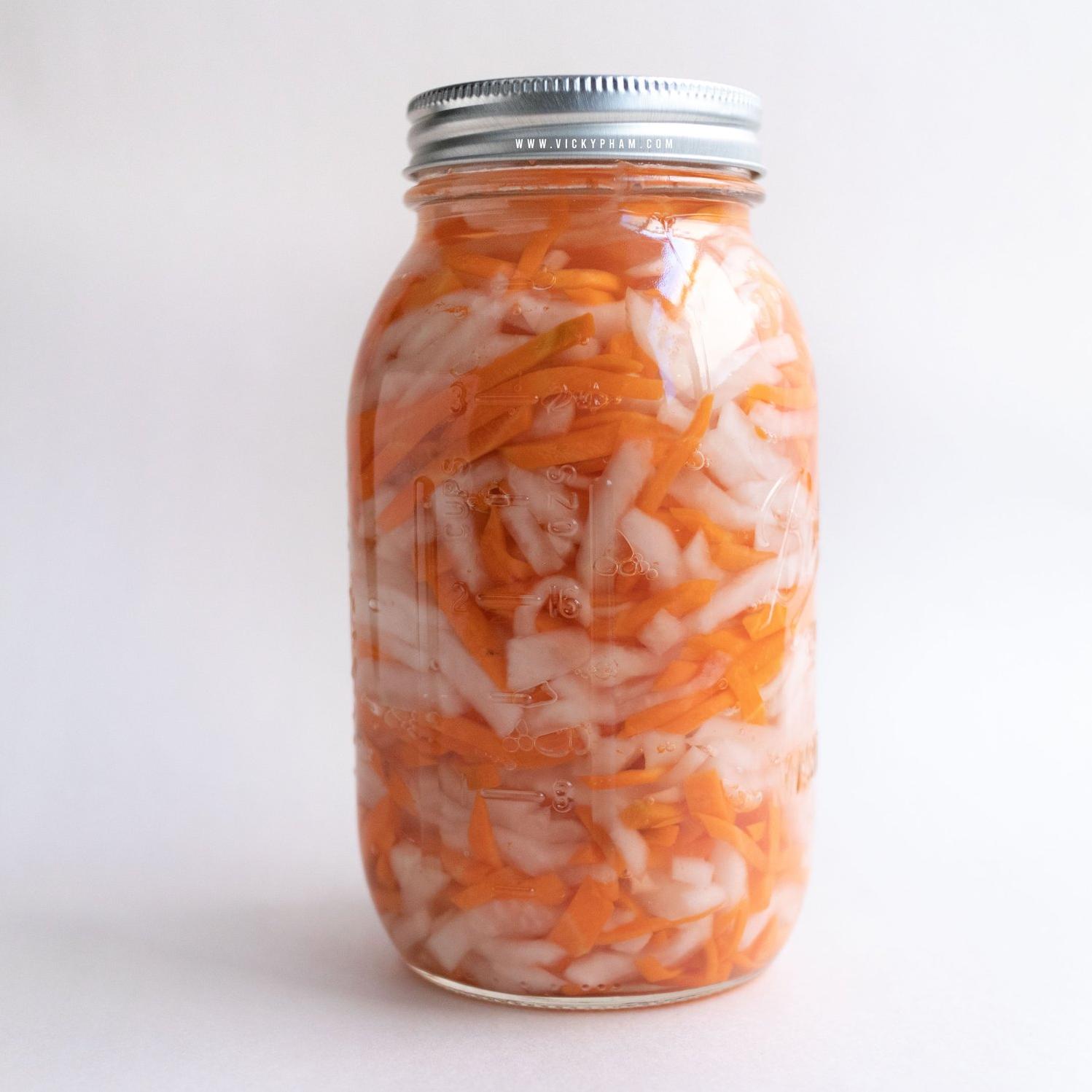  Aromatics like garlic, ginger and chili flakes add bold flavor to this pickled dish.