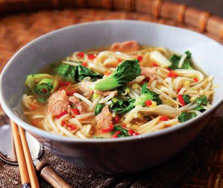  Dive into a bowl of flavorful broth, juicy pork, and perfectly cooked rice noodles.