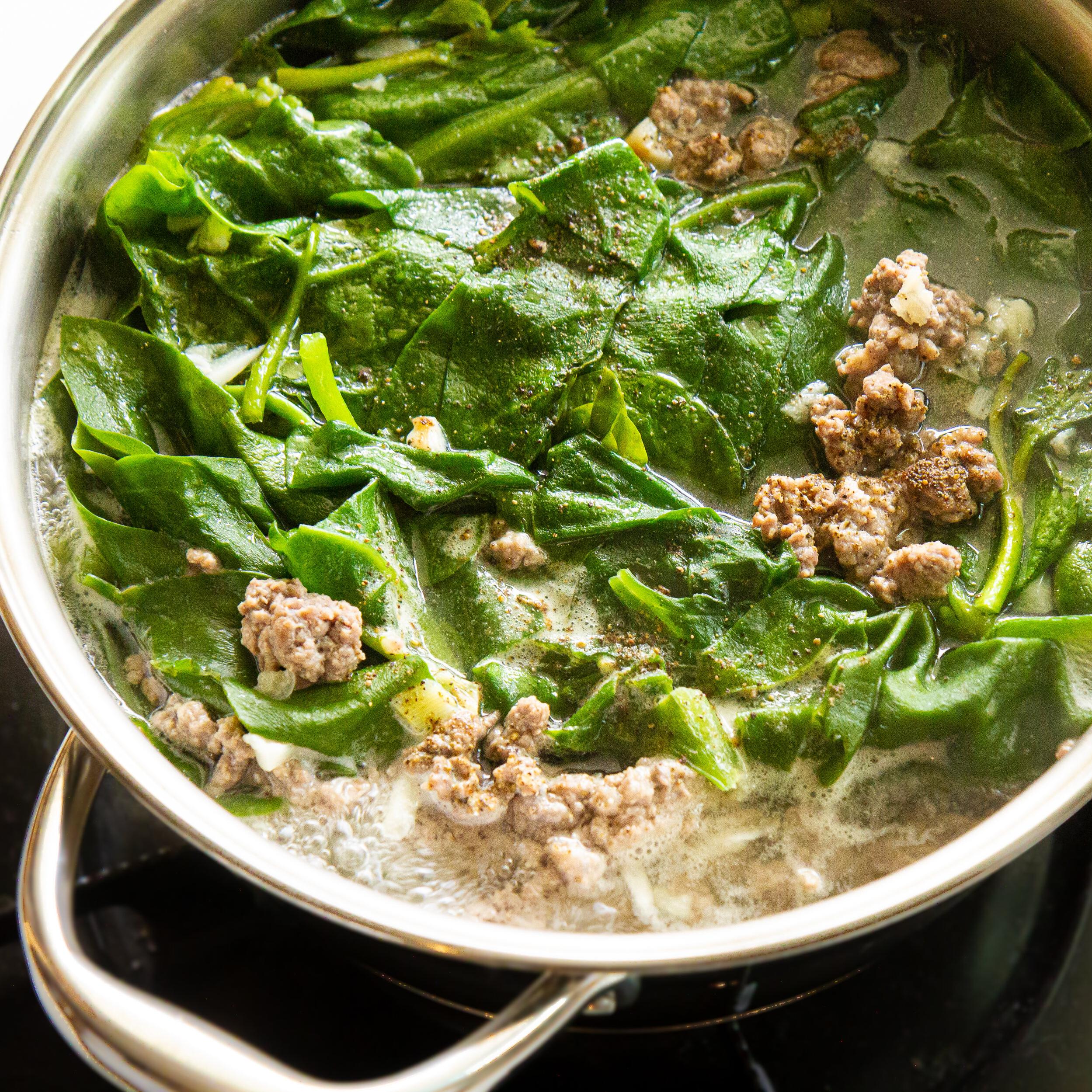  Dive into this savory bowl of Vietnamese Beef and Spinach Soup!