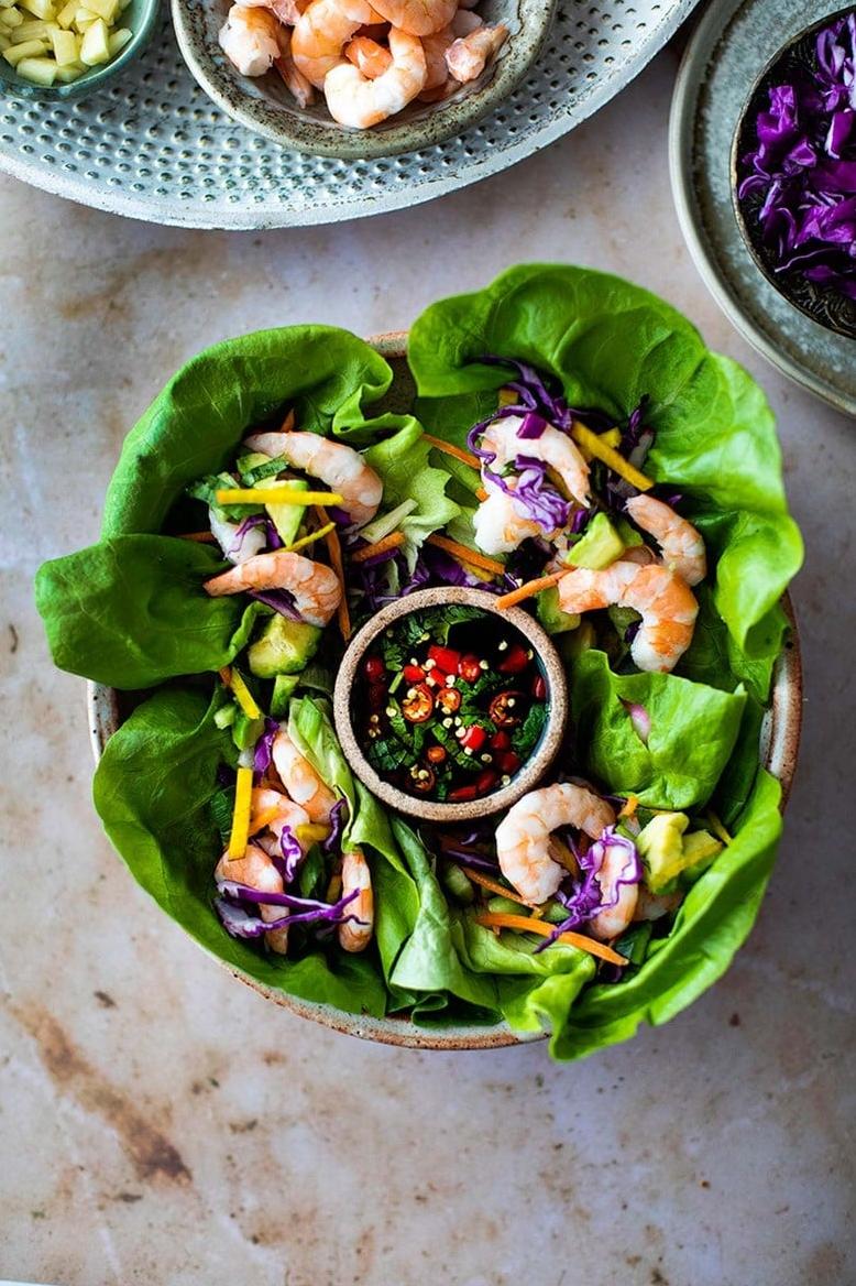  Fresh lettuce cups make for a light and refreshing vessel to hold the savory shrimp filling.