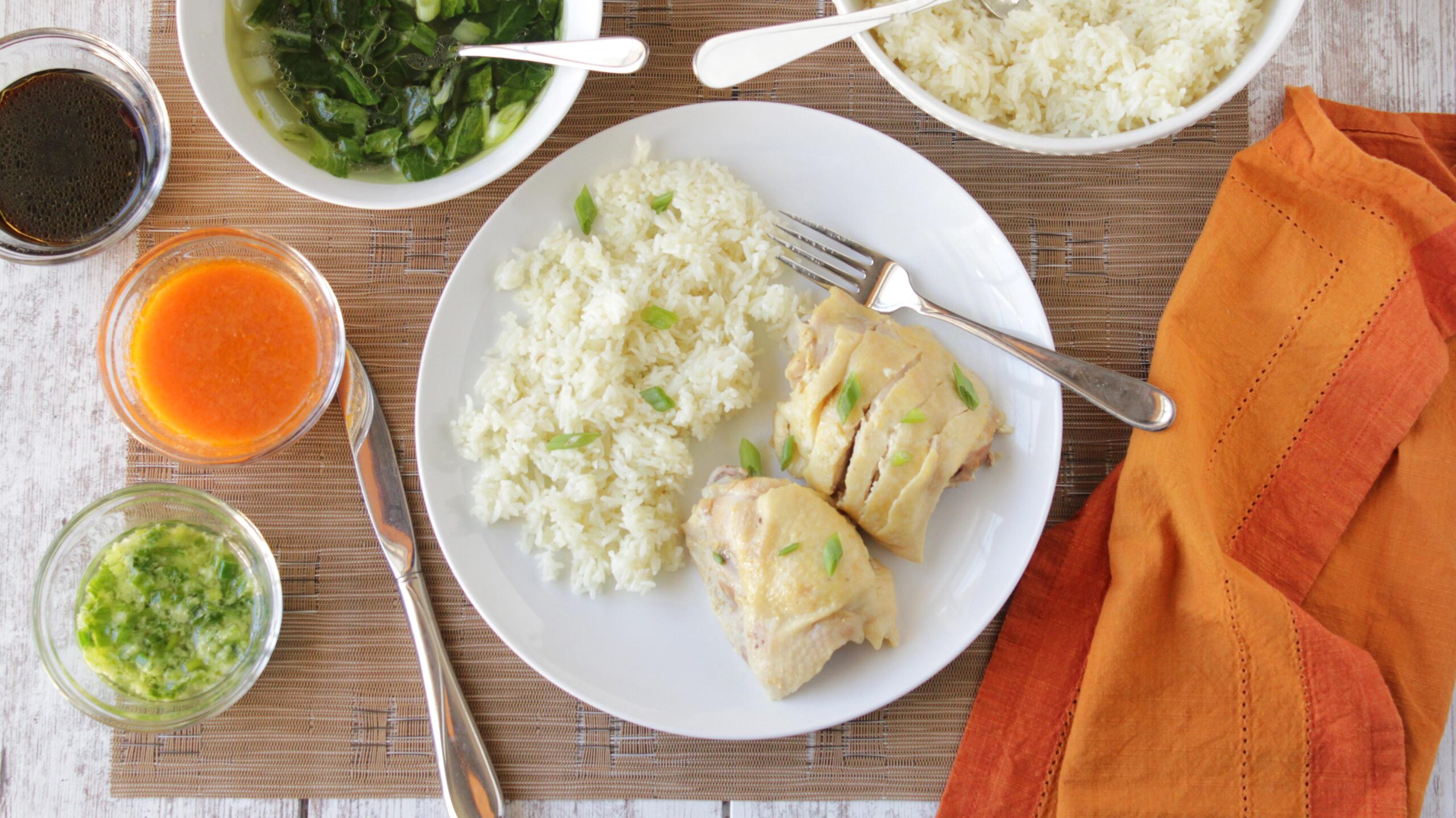  Juicy and tender Hainanese chicken with fragrant rice cooked to perfection.