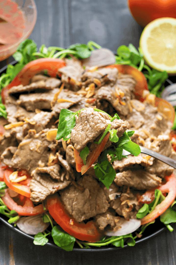  Satisfy your craving for Asian cuisine with the bold and fragrant flavors of this beef salad.