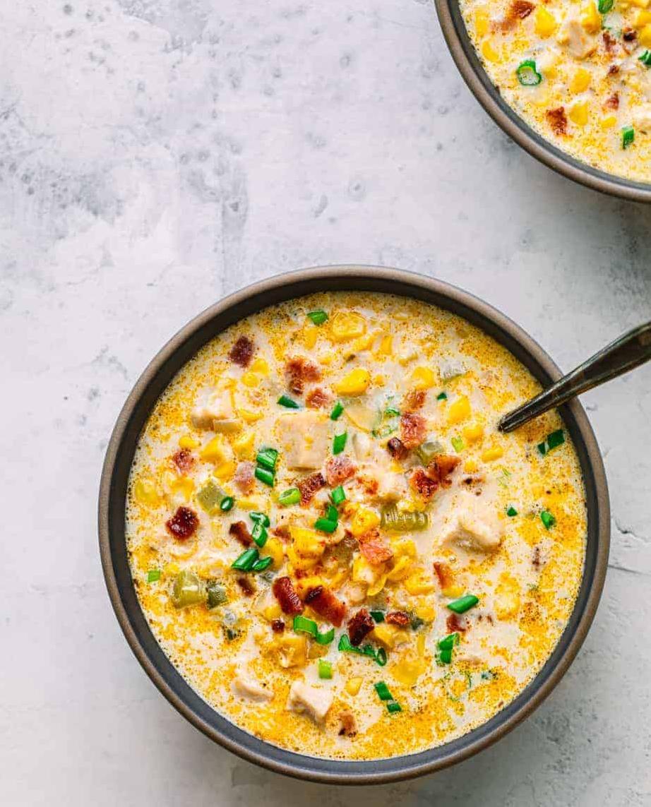  Smoky bacon adds depth of flavor to the chowder, enhancing the taste of the chicken and veggies.