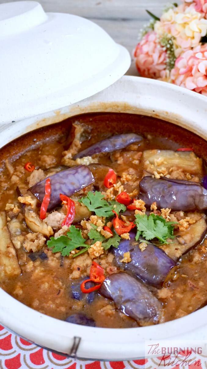  Spoonfuls of tender pork and eggplant in a spicy broth, perfect for a cozy night.