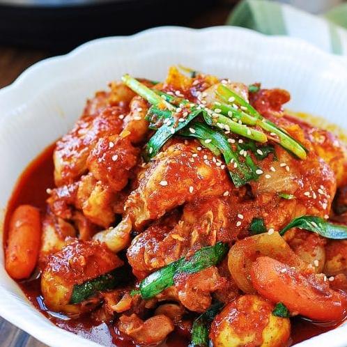  Tender chicken smothered in a spicy, savory sauce