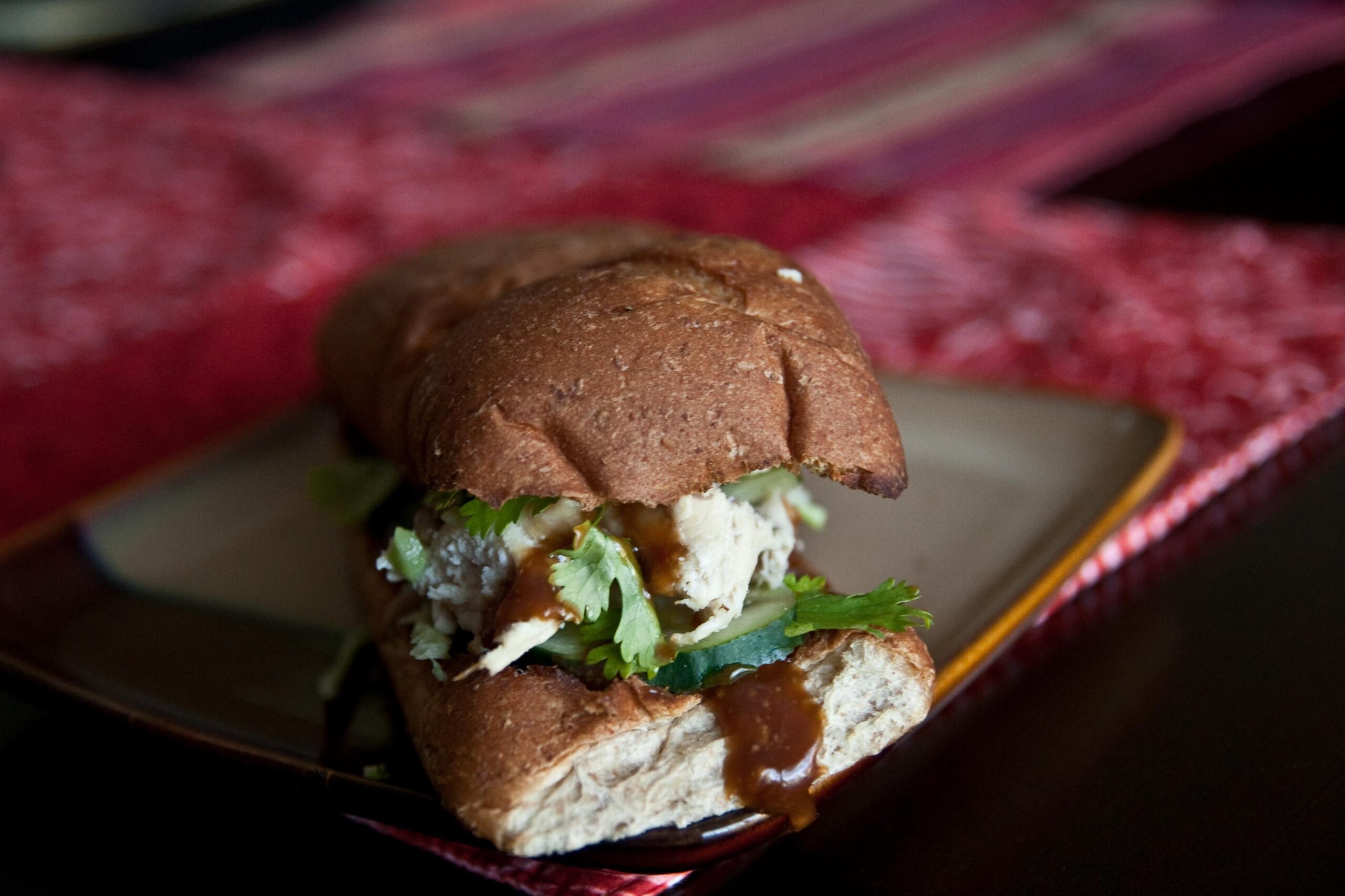 The ultimate Vietnamese sandwich with tender chicken, crisp veggies, and a tangy sauce!