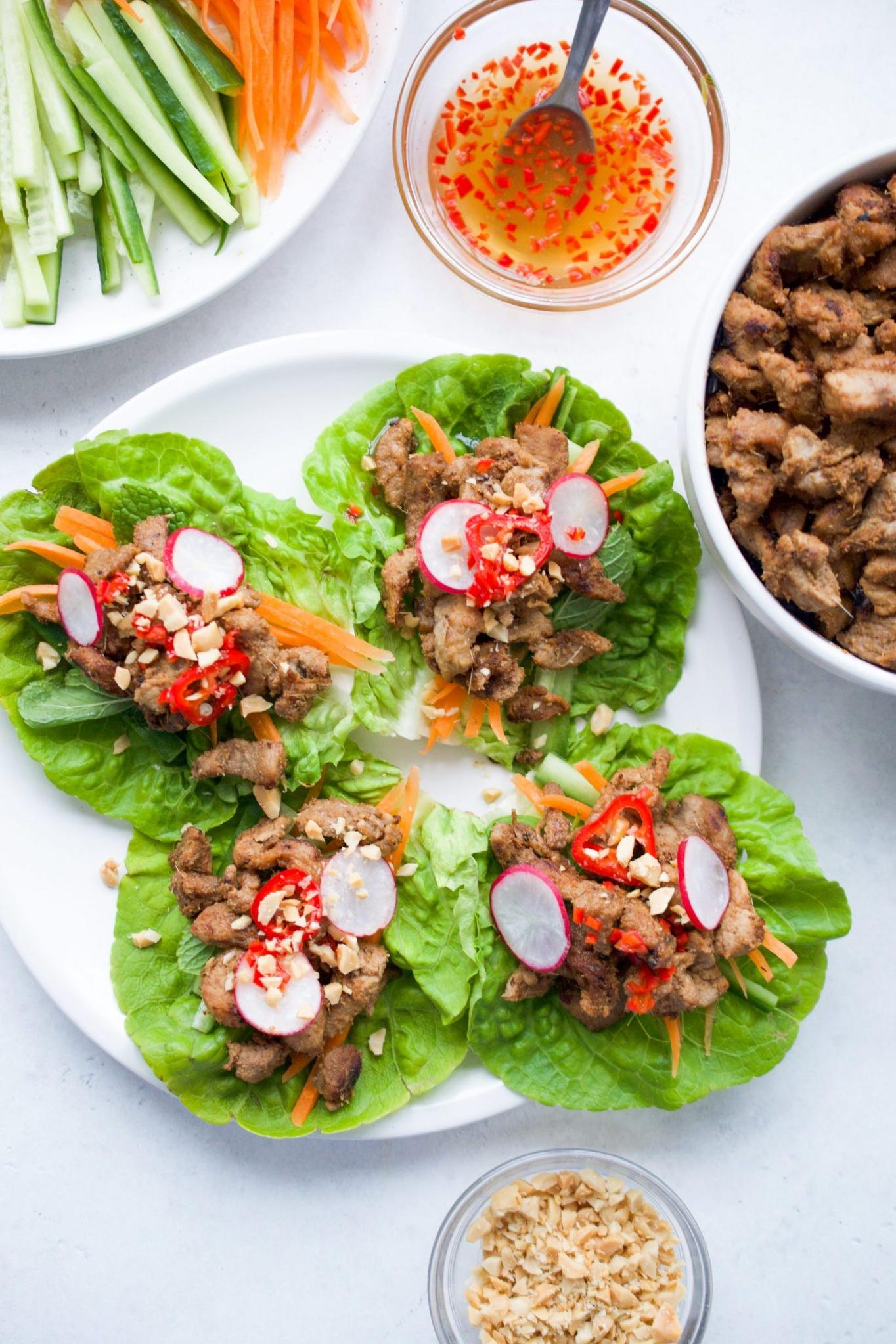  Want to impress your guests with some Asian-style appetizers? Try these grilled pork lettuce wraps, they won't disappoint!