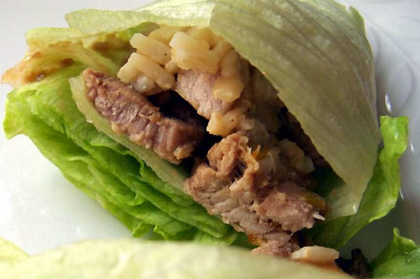  You won't believe how sumptuous these lettuce wraps with the pork filling and scallion garnish are!